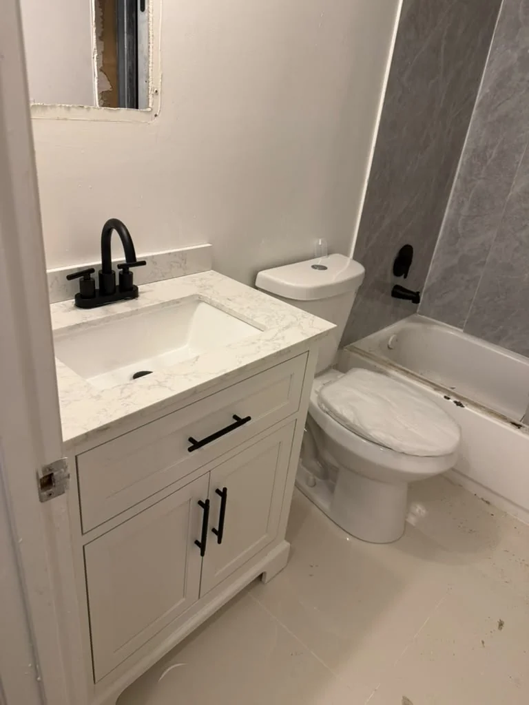 Bathroom · Vanity and faucet installed; details pending